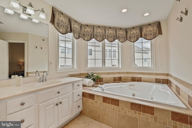 440 Clayton Ln, Alexandria, VA 22304 - bathroom with a whirlpool tub, healthy amount of natural light, vanity, tile patterned flooring, and recessed lighting
