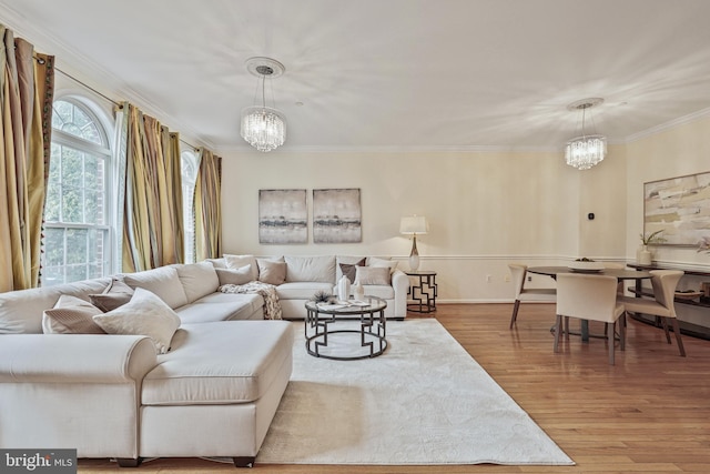 440 Clayton Ln, Alexandria, VA 22304 - living room with a chandelier, crown molding, and wood finished floors