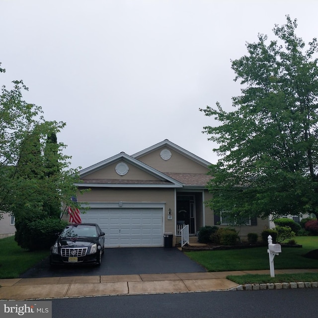 49 Chamber Ln, Columbus, NJ 08022 - single story home featuring an attached garage, driveway, and a front lawn