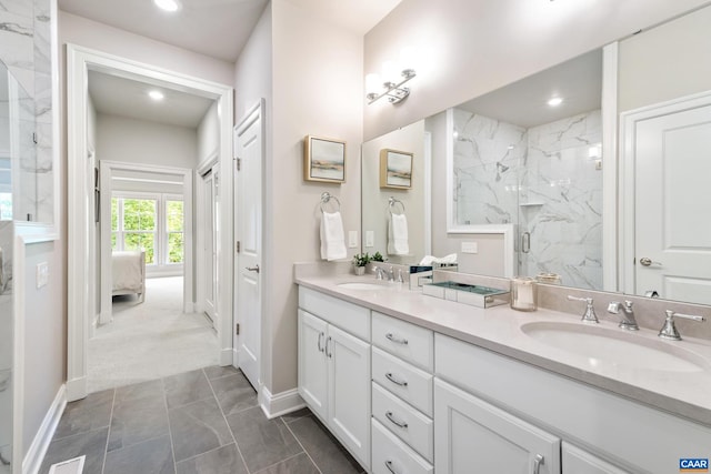 312 Avondale Ln, Crozet, VA 22932 - bathroom featuring double vanity, a marble finish shower, marble finish flooring, and recessed lighting