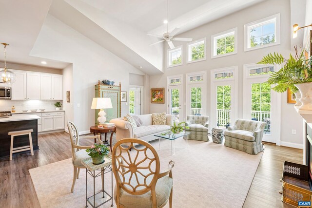 312 Avondale Ln, Crozet, VA 22932 - living area featuring a towering ceiling, wood finished floors, a ceiling fan, and recessed lighting