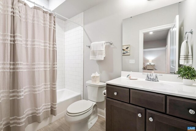 312 Avondale Ln, Crozet, VA 22932 - full bath featuring vanity, shower / tub combo with curtain, and wood finished floors