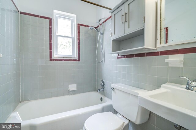 421 Jefferson St NE, Washington, DC 20011 - bathroom with shower / bath combination and tile walls