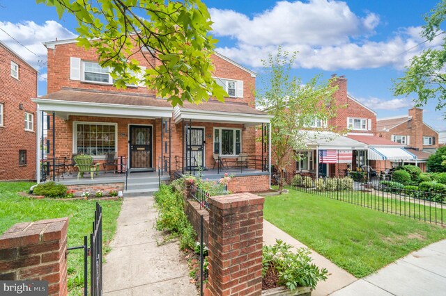 421 Jefferson St NE, Washington, DC 20011 - view of front facade with covered porch and brick siding