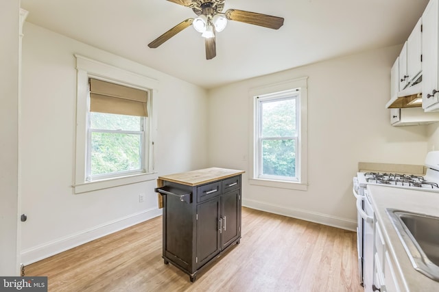10 W Jefferson St, Media, PA 19063 - kitchen with plenty of natural light, white range with gas cooktop, and light wood-style floors