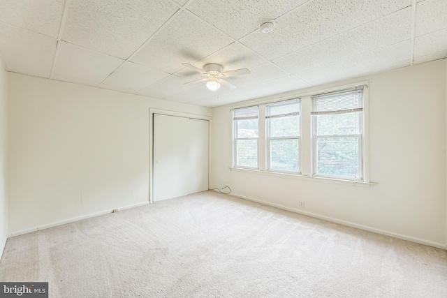 10 W Jefferson St, Media, PA 19063 - unfurnished bedroom with carpet flooring, a paneled ceiling, a closet, and ceiling fan