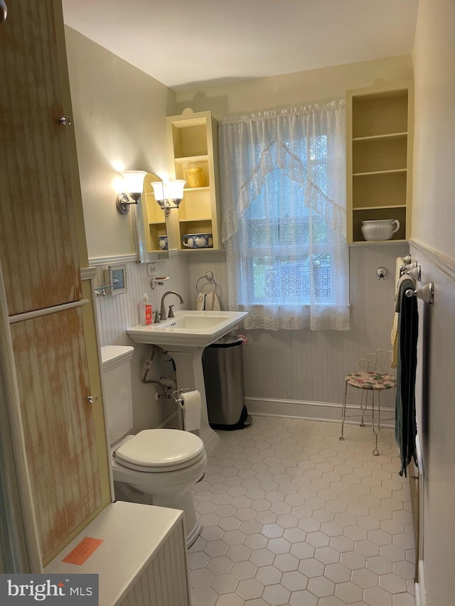 15004 Leetown Rd, Kearneysville, WV 25430 - bathroom with wainscoting and tile patterned floors