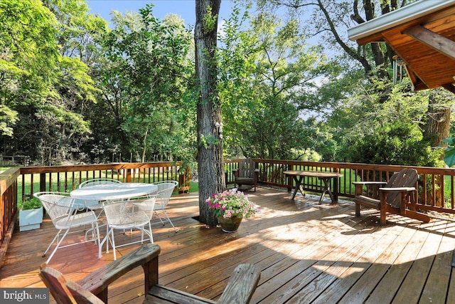 15004 Leetown Rd, Kearneysville, WV 25430 - wooden terrace with outdoor dining area and view of wooded area