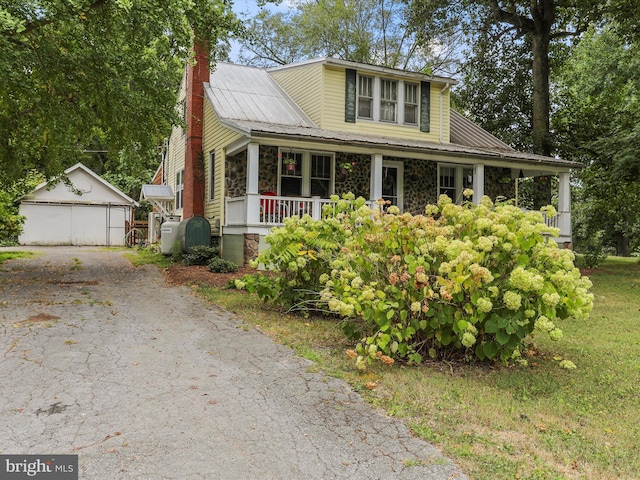 15004 Leetown Rd, Kearneysville, WV 25430 - view of front of home with a chimney, a porch, an outbuilding, and stone siding