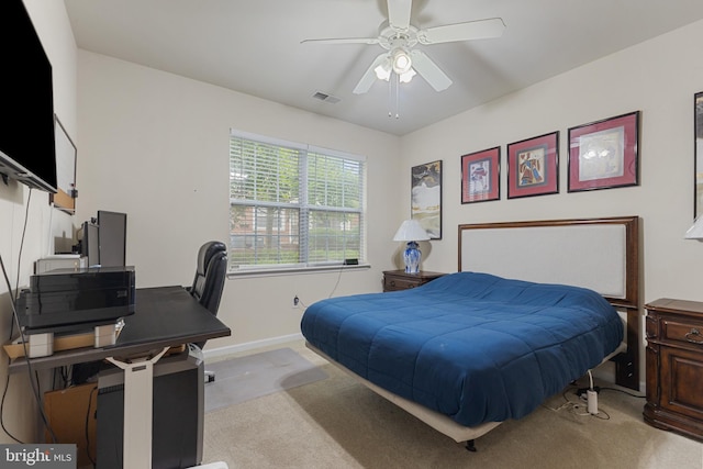 12921 Centre Park Cir Unit 102, Herndon, VA 20171 - bedroom with light carpet, an office area, and a ceiling fan