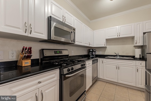 12921 Centre Park Cir Unit 102, Herndon, VA 20171 - kitchen featuring stainless steel appliances, ornamental molding, dark countertops, white cabinetry, and light tile patterned flooring