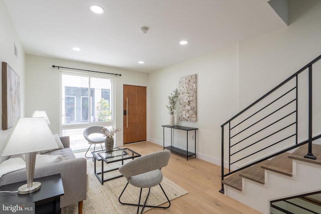 622 Mcclellan St, Philadelphia, PA 19148 - living room with stairs, light wood finished floors, and recessed lighting