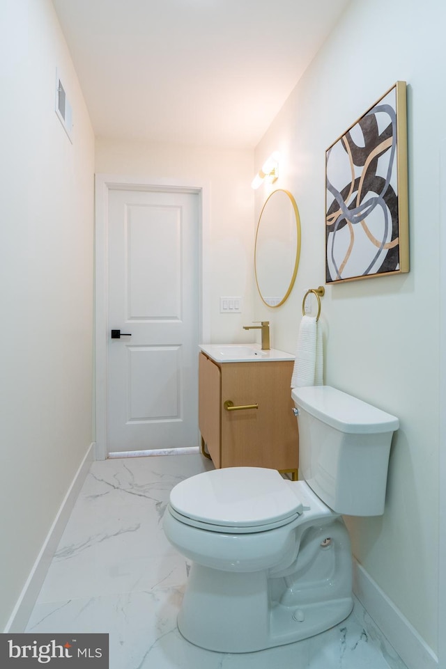 622 Mcclellan St, Philadelphia, PA 19148 - half bathroom featuring marble finish floors and vanity