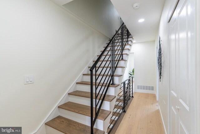 622 Mcclellan St, Philadelphia, PA 19148 - staircase with wood-type flooring and recessed lighting