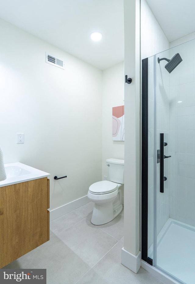 622 Mcclellan St, Philadelphia, PA 19148 - bathroom with a shower stall, vanity, and tile patterned floors