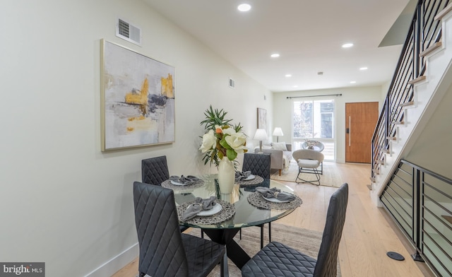 622 Mcclellan St, Philadelphia, PA 19148 - dining room with light wood-style floors, recessed lighting, and stairs