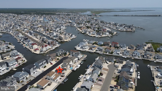 51 Ralph Ln, Manahawkin, NJ 08050 - aerial view of property and surrounding area featuring a large body of water and nearby suburban area
