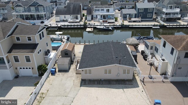 51 Ralph Ln, Manahawkin, NJ 08050 - aerial perspective of suburban area featuring a nearby body of water