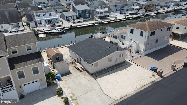 51 Ralph Ln, Manahawkin, NJ 08050 - aerial perspective of suburban area featuring a large body of water