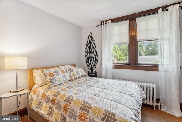 4009 Oglethorpe St, Hyattsville, MD 20782 - bedroom with wood finished floors and radiator