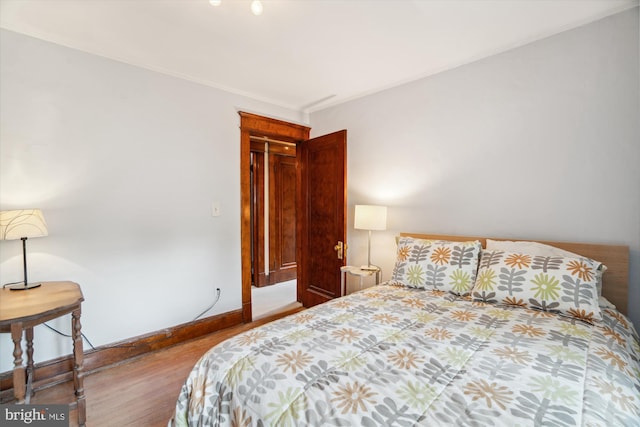 4009 Oglethorpe St, Hyattsville, MD 20782 - bedroom featuring wood finished floors and crown molding