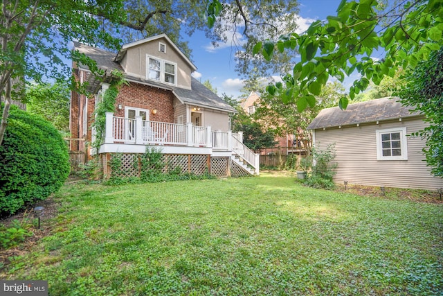 4009 Oglethorpe St, Hyattsville, MD 20782 - back of house with stairs, a deck, brick siding, stucco siding, and roof with shingles