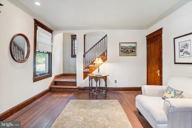 4009 Oglethorpe St, Hyattsville, MD 20782 - living area with stairs, hardwood / wood-style flooring, arched walkways, ornamental molding, and recessed lighting
