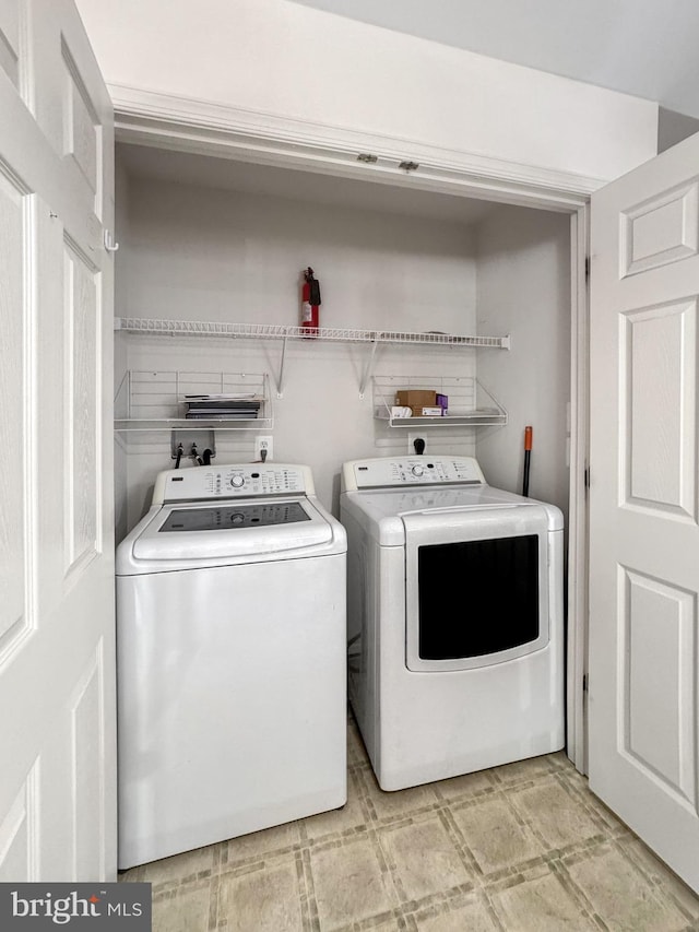 215 Westlake Blvd, Prince Frederick, MD 20678 - washroom featuring washer and clothes dryer