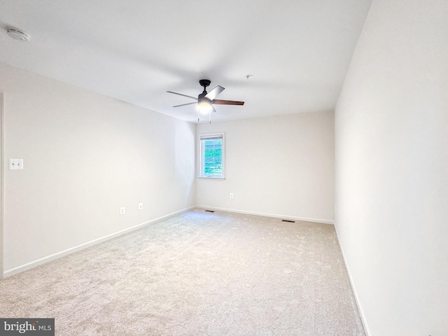 215 Westlake Blvd, Prince Frederick, MD 20678 - spare room featuring light colored carpet, a ceiling fan, and a smoke detector