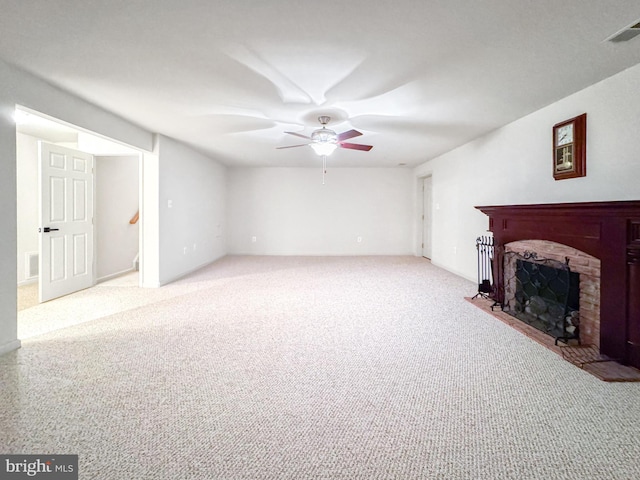 215 Westlake Blvd, Prince Frederick, MD 20678 - unfurnished living room featuring a ceiling fan, carpet, and a fireplace