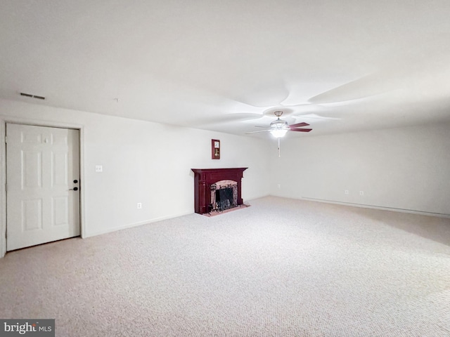 215 Westlake Blvd, Prince Frederick, MD 20678 - unfurnished living room with a ceiling fan, carpet, and a fireplace