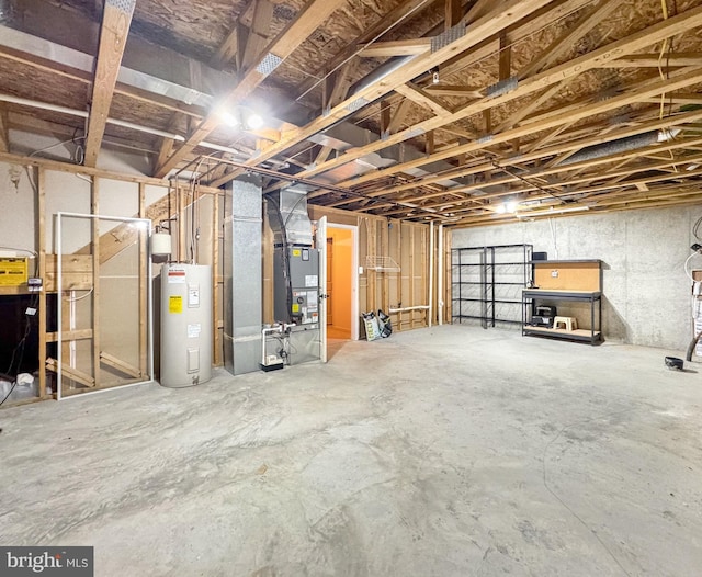 215 Westlake Blvd, Prince Frederick, MD 20678 - unfinished below grade area featuring electric water heater and heating unit