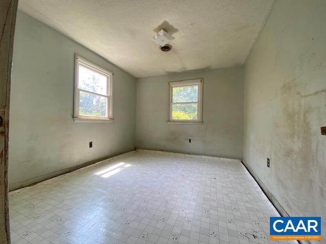 1430 Shenandoah Ave, Waynesboro, VA 22980 - empty room with tile patterned floors