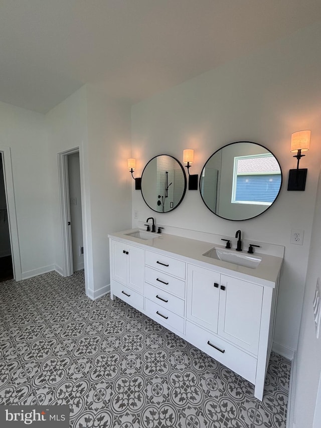 36821 W Old Gate Dr, Georgetown, DE 19947 - full bathroom with double vanity and baseboards