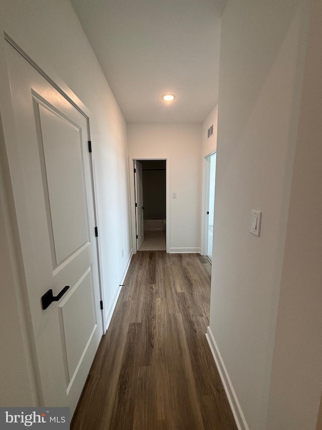 36821 W Old Gate Dr, Georgetown, DE 19947 - corridor with dark wood-style floors and recessed lighting