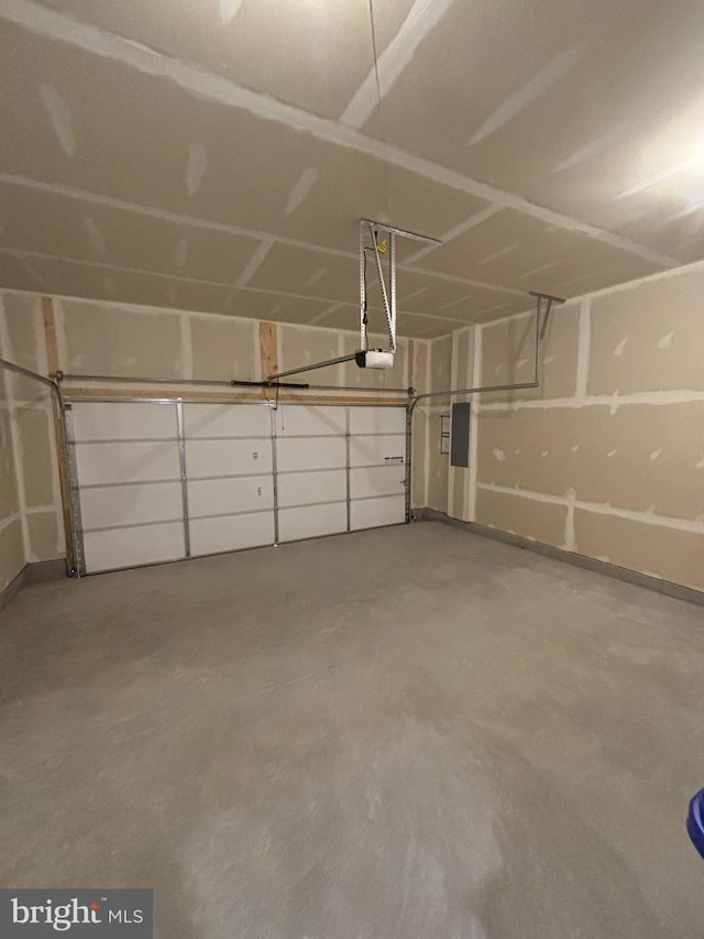 36821 W Old Gate Dr, Georgetown, DE 19947 - garage with a garage door opener and electric panel