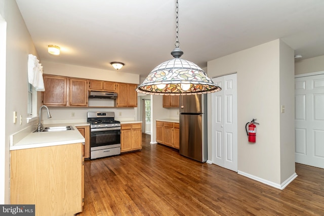 52 Jonquil Way, Sicklerville, NJ 08081 - kitchen featuring appliances with stainless steel finishes, under cabinet range hood, dark wood finished floors, light countertops, and pendant lighting