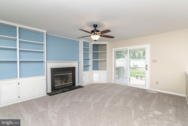 52 Jonquil Way, Sicklerville, NJ 08081 - unfurnished living room with ceiling fan, a glass covered fireplace, carpet, and built in features
