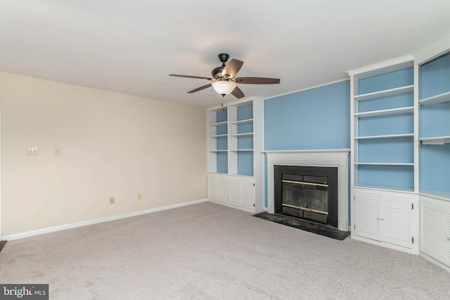 52 Jonquil Way, Sicklerville, NJ 08081 - unfurnished living room featuring carpet flooring, a fireplace with flush hearth, a ceiling fan, and built in shelves