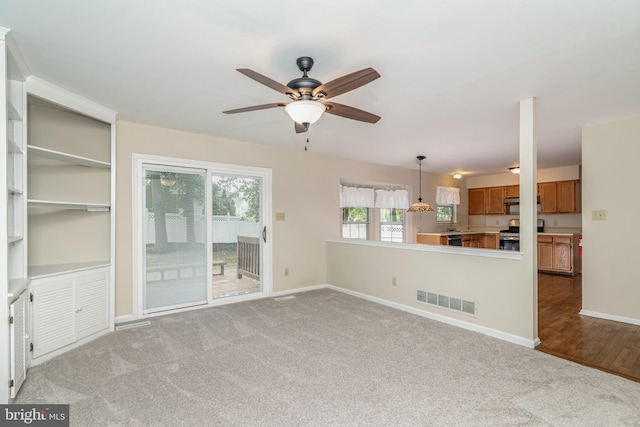 52 Jonquil Way, Sicklerville, NJ 08081 - unfurnished living room with a ceiling fan and light carpet