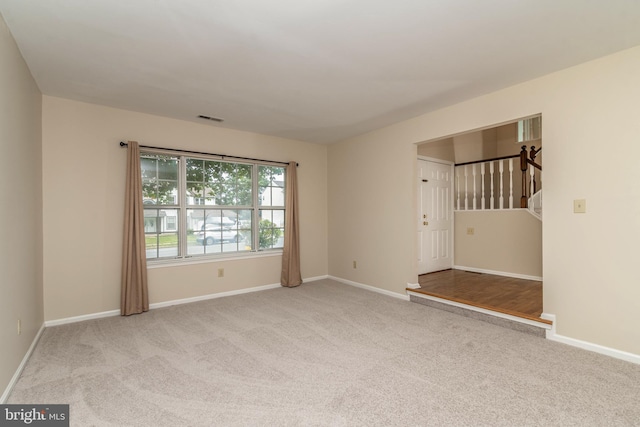 52 Jonquil Way, Sicklerville, NJ 08081 - carpeted empty room featuring baseboards and stairs