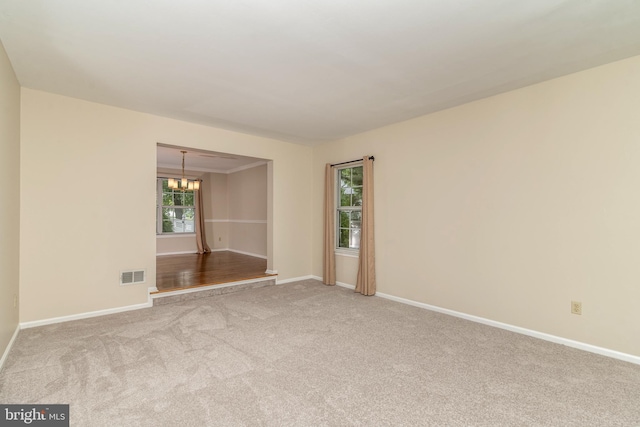 52 Jonquil Way, Sicklerville, NJ 08081 - carpeted spare room with a chandelier and baseboards