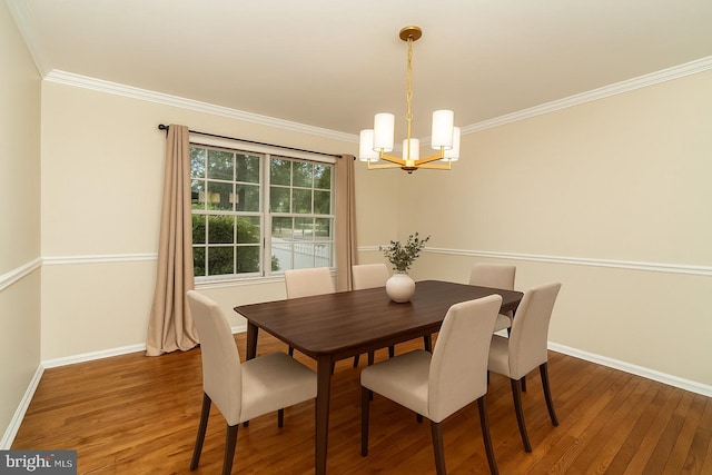 52 Jonquil Way, Sicklerville, NJ 08081 - dining area featuring a chandelier, wood finished floors, and crown molding