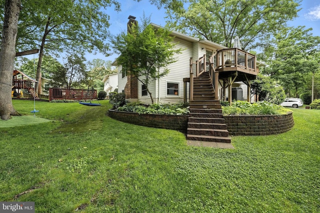 8823 Newport Ct, Springfield, VA 22153 - back of house featuring stairs, a deck, a chimney, and a lawn