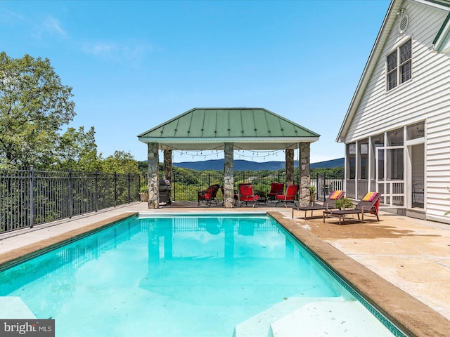 400 Deer Run Cir, Front Royal, VA 22630 - view of pool with a gazebo, a sunroom, a fenced backyard, a patio, and area for grilling