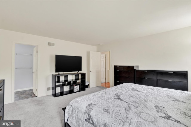 1765 Ivy Pump Ln, York, PA 17408 - bedroom with carpet floors and a walk in closet