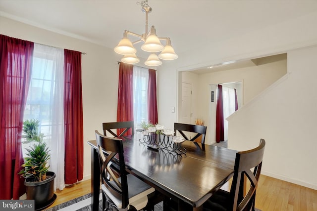 1765 Ivy Pump Ln, York, PA 17408 - dining space with a chandelier, plenty of natural light, and light wood-type flooring