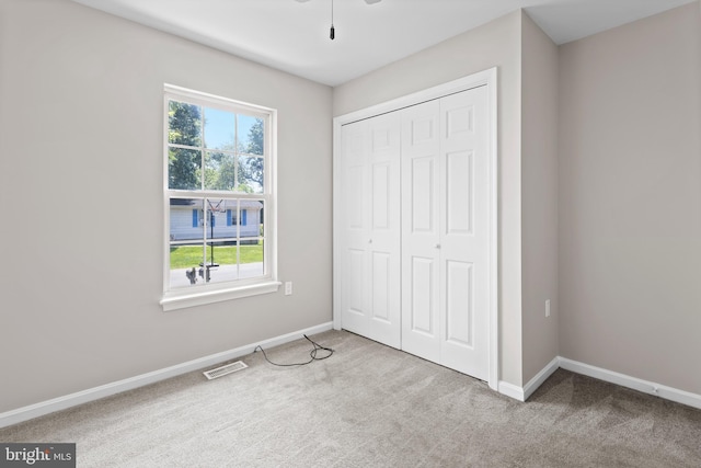 6104 9th St, Chesapeake Beach, MD 20732 - unfurnished bedroom with carpet and a closet