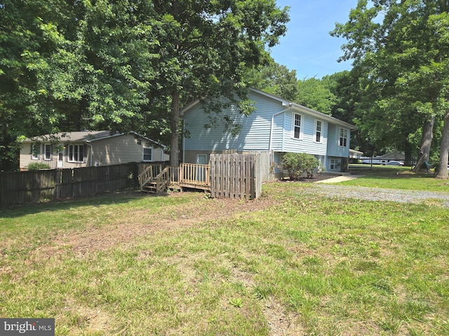 6104 9th St, Chesapeake Beach, MD 20732 - view of yard featuring a deck