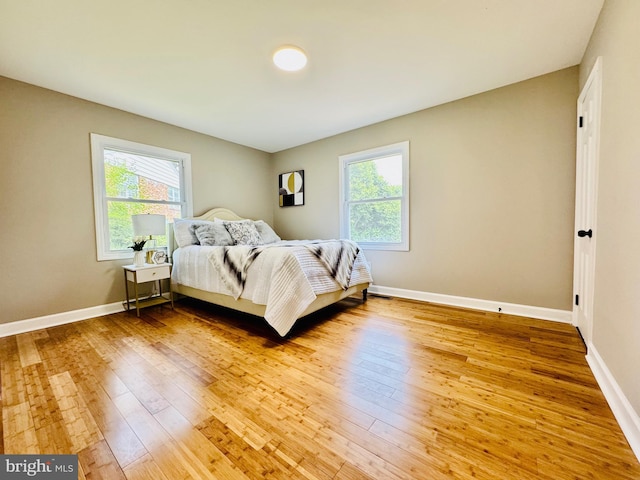5933 Westridge Ct, Alexandria, VA 22310 - bedroom featuring hardwood / wood-style flooring and multiple windows